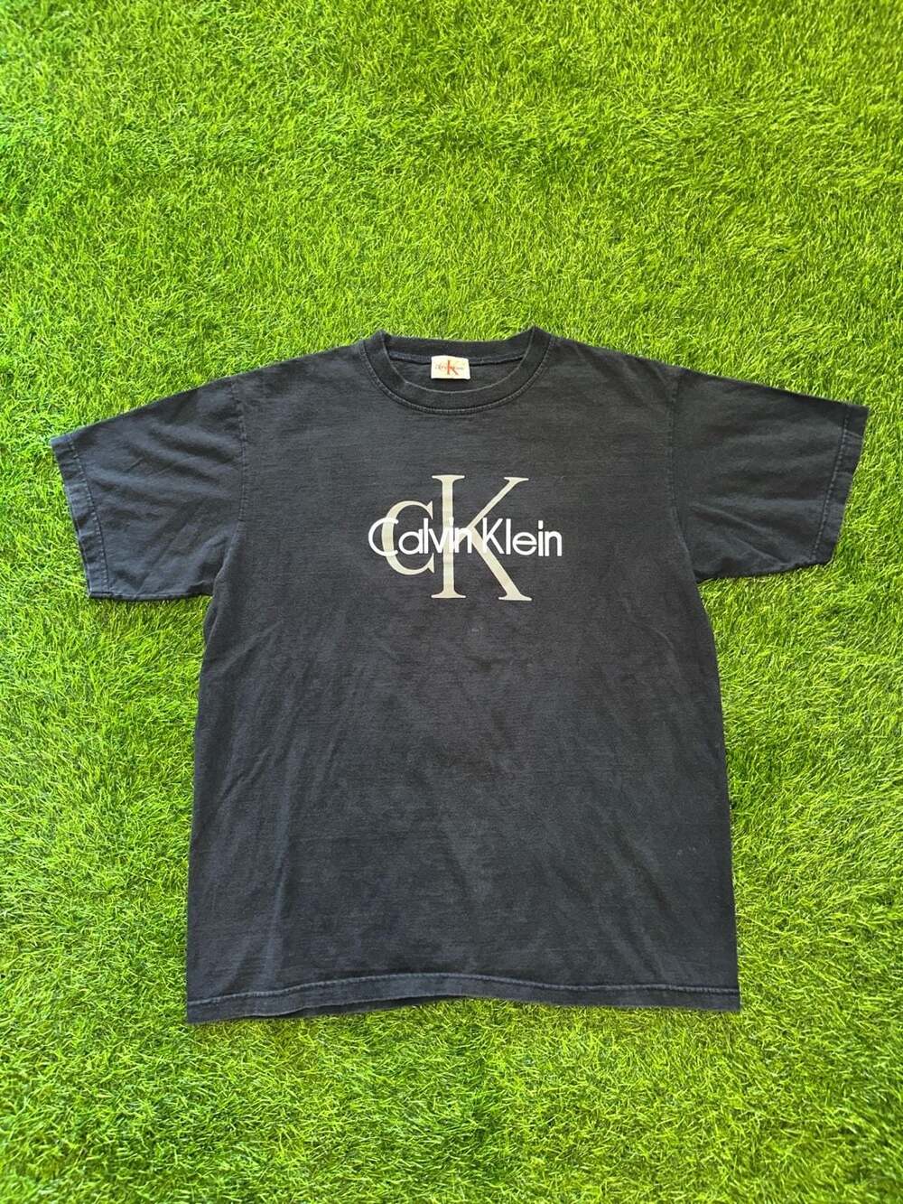 Vintage Calvin Klein Black Center Logo Spellout T-Shirt size medium